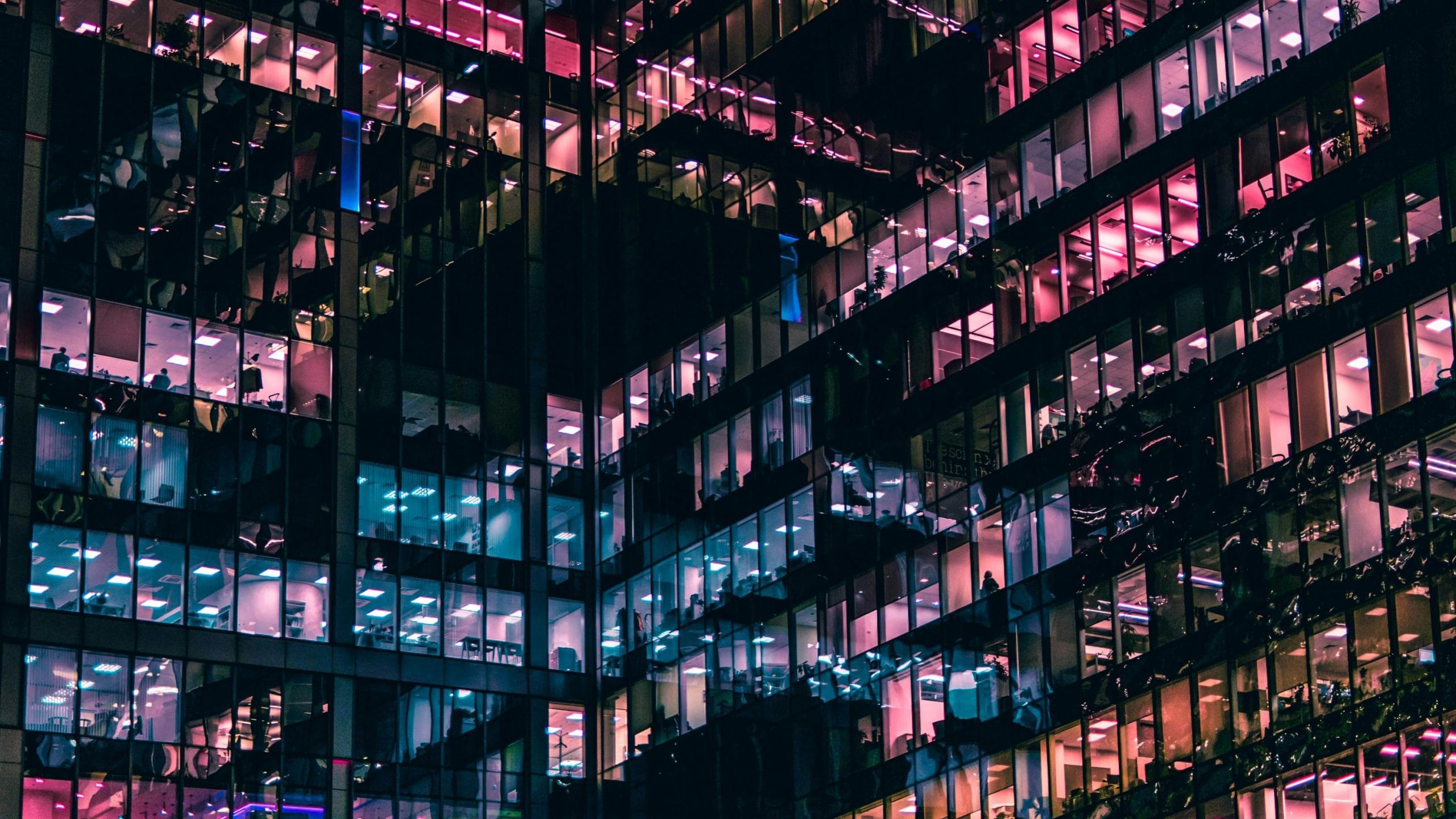 Office tower windows at night